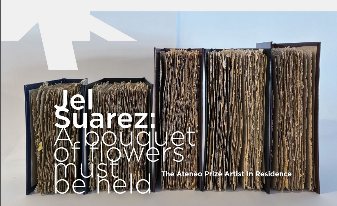 A photo of 5 books with antique pages standing up. Artwork by Jel Suarez, recipient of the Ateneo Prize Artist in Residence at OCADU